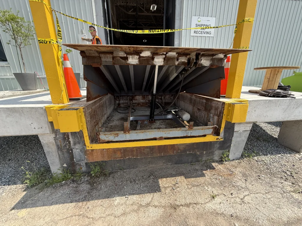 Loading dock leveller pit opened for structural assessment