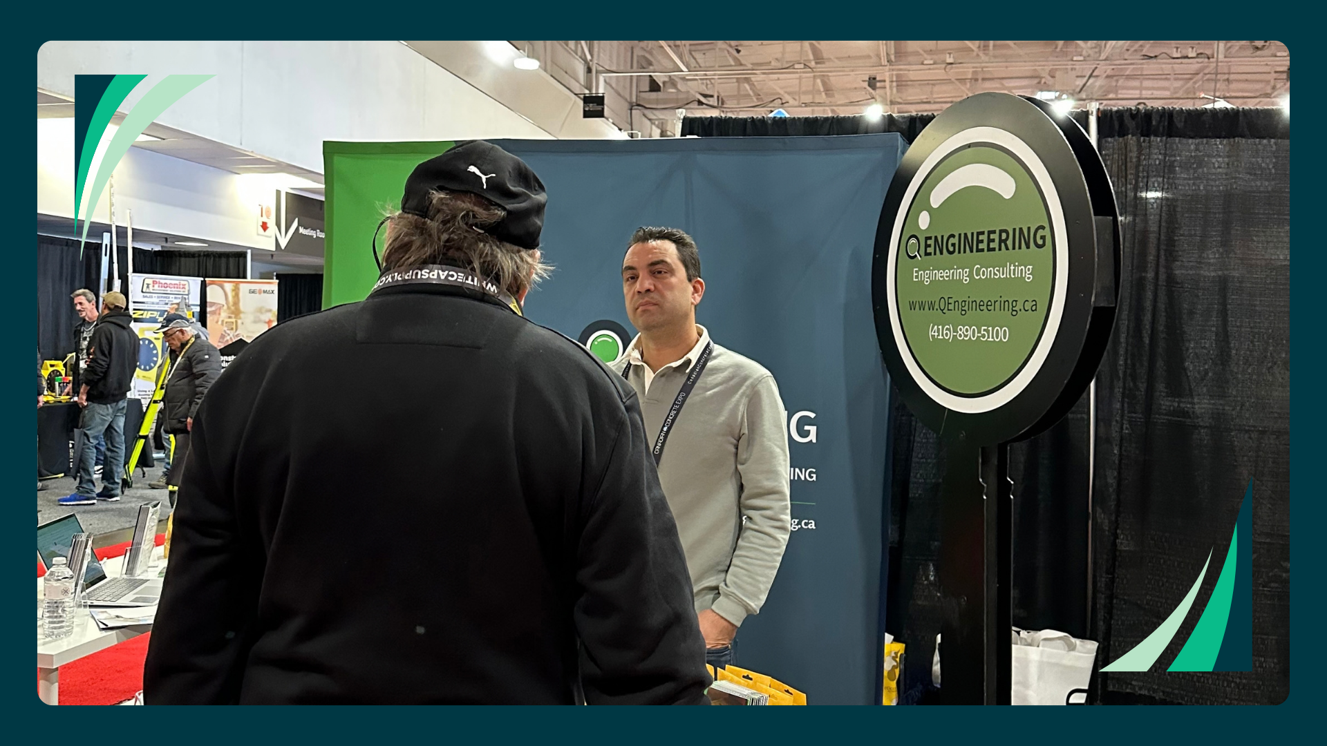 Q Engineering staff meeting a visitor at the Canadian Concrete Expo